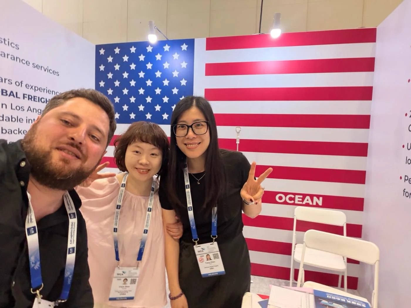 AGF team taking a selfie with partners at the WCA Worldwide Conference booth